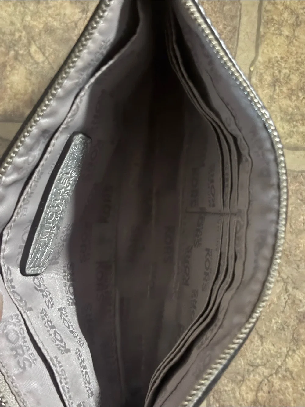 Michael Kors Gray Metallic Interior Wristlet